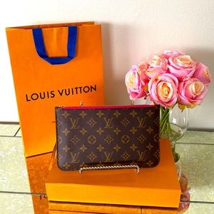 Authentic Louis Vuitton Monogram Wristlet/Clutch. Peony interior.